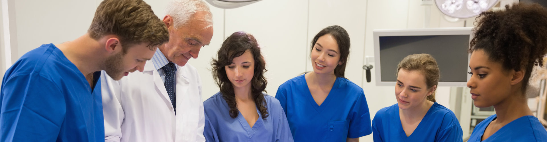 a doctor and newly training medical staffs